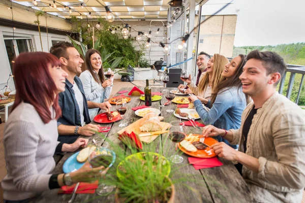 Friends having lunch at home — Stock Photo, Image