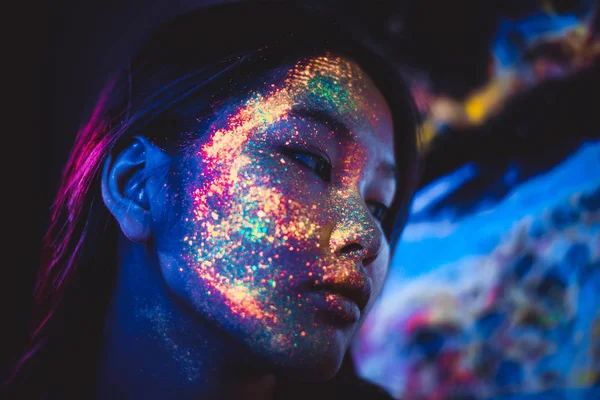 Beautiful young woman dancing and making party with fluorescent — Stock Photo, Image