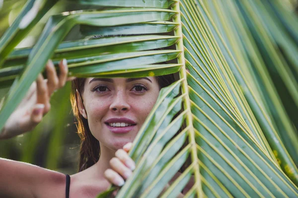 stock image Beautiful girl relaxing outdoor in her garden with swimming pool