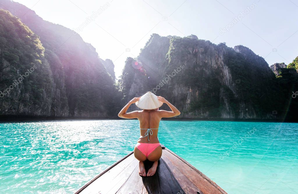 Beautiful woman making an excursion to phi phi island and maya b