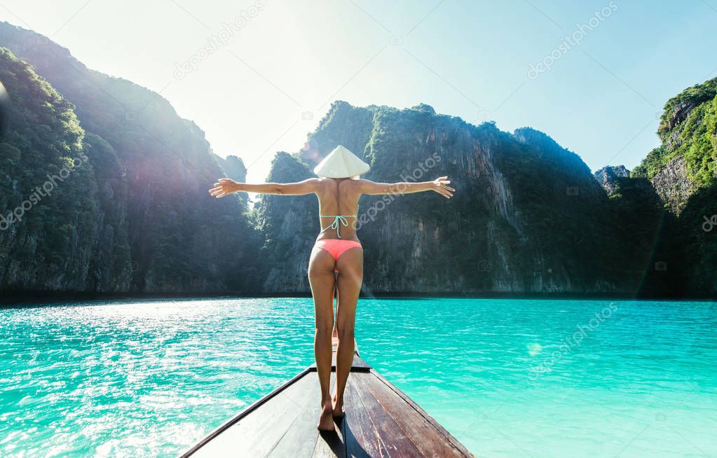 Beautiful woman making an excursion to phi phi island and maya b