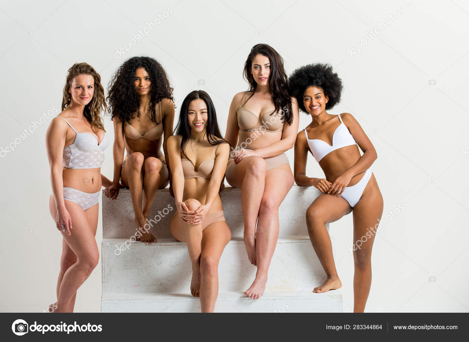 Beautiful women posing in underwear Stock Photo by ©oneinchpunch 283344864