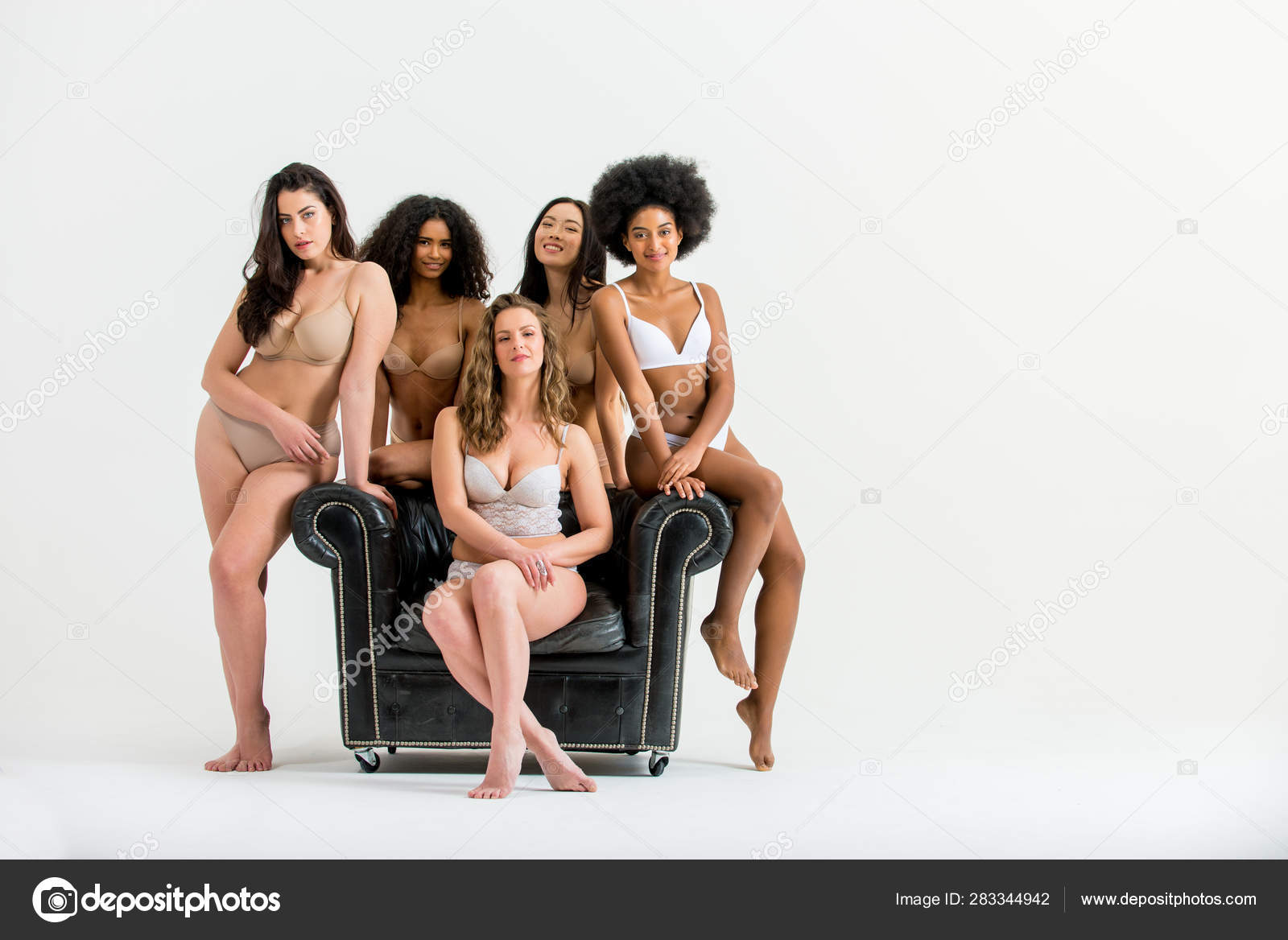Beautiful women posing in underwear Stock Photo by ©oneinchpunch