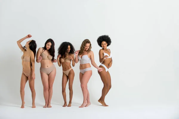 Beautiful women posing in underwear — Stock Photo, Image