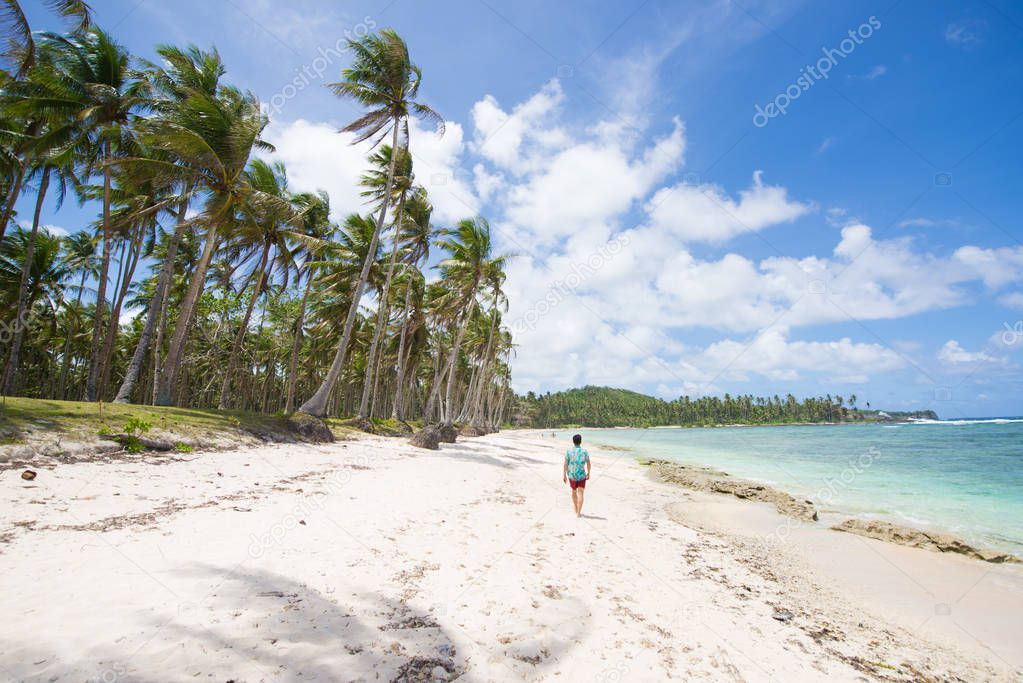 Tourist on a tropical beach in the Philippines