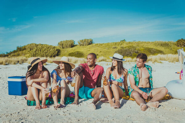 Friends having fun on the beach