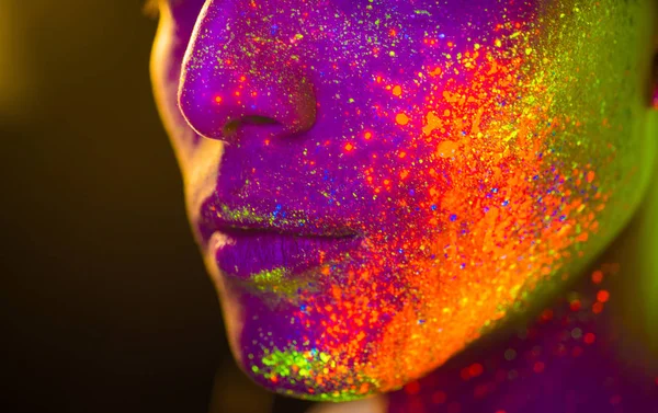 Fashion model with fluo painting on the face — Stock Photo, Image