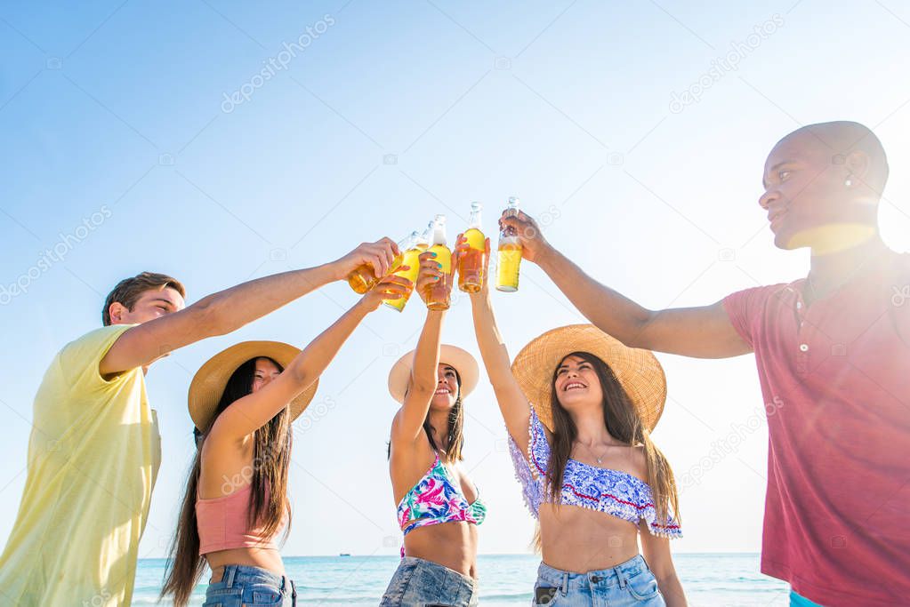 Friends having fun on the beach