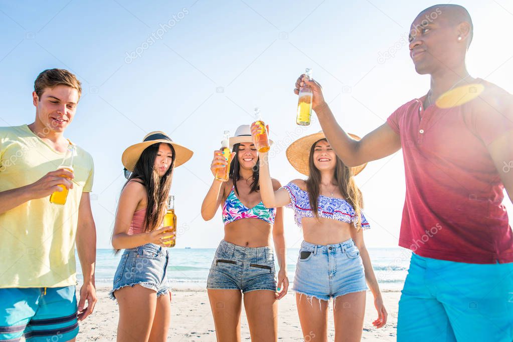 Friends having fun on the beach