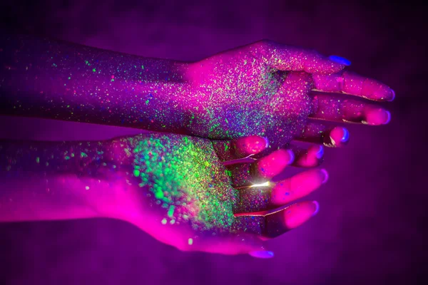 Fashion model with fluo painting on the hands — Stock Photo, Image