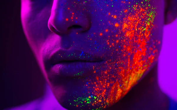 Fashion model with fluo painting on the face — Stock Photo, Image