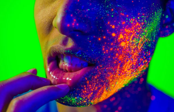 Fashion model with fluo painting on the face — Stock Photo, Image