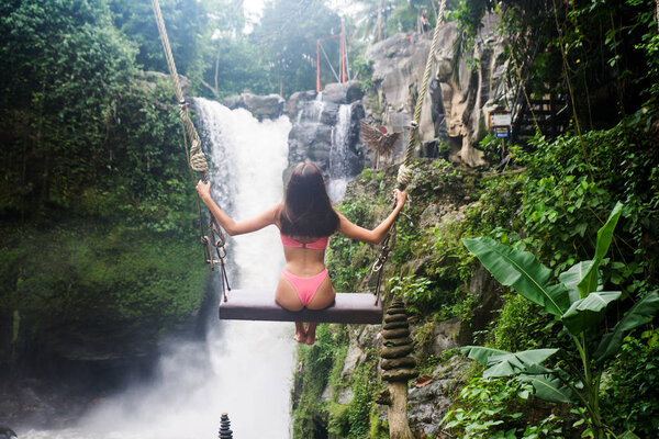 Pretty girl at Tegenungan Waterfall, Bali