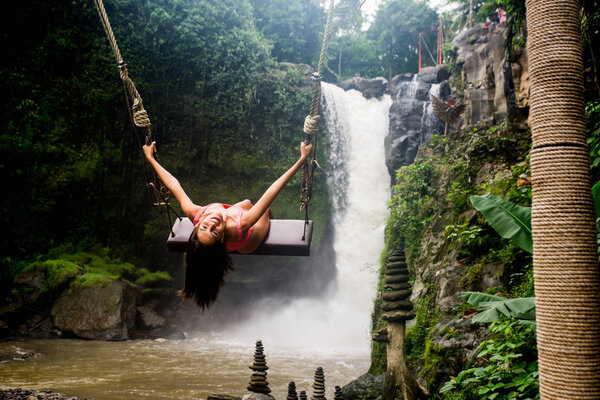 Pretty girl at Tegenungan Waterfall, Bali