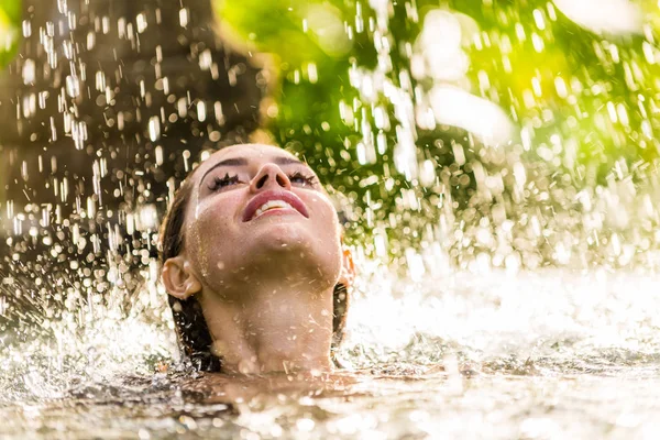 Woman in a swimming pool in Bali — Stock Photo, Image