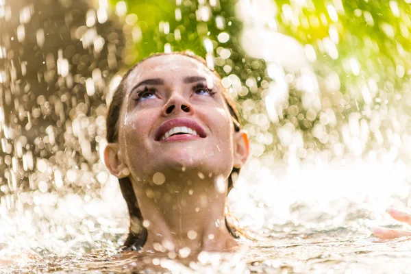 Woman in a swimming pool in Bali — Stock Photo, Image