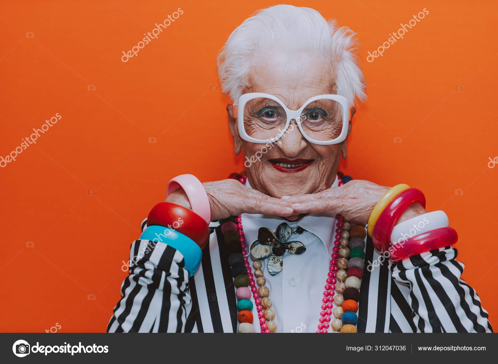 Funny grandmother portraits. Senior old woman dressing elegant f Stock  Photo by ©oneinchpunch 312047036