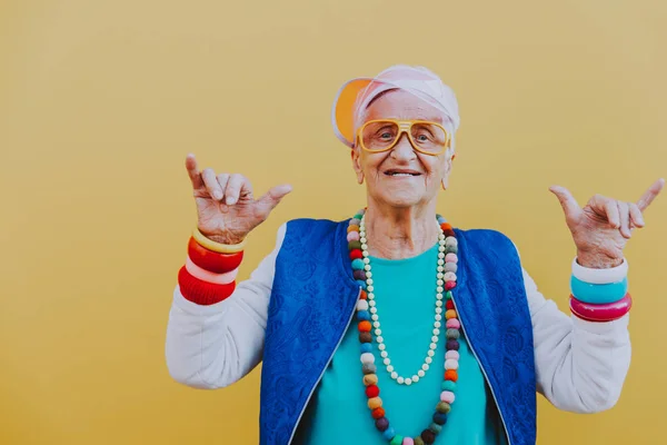 Funny grandmother portraits. 80s style outfit. trapstar dance on — Stock Photo, Image