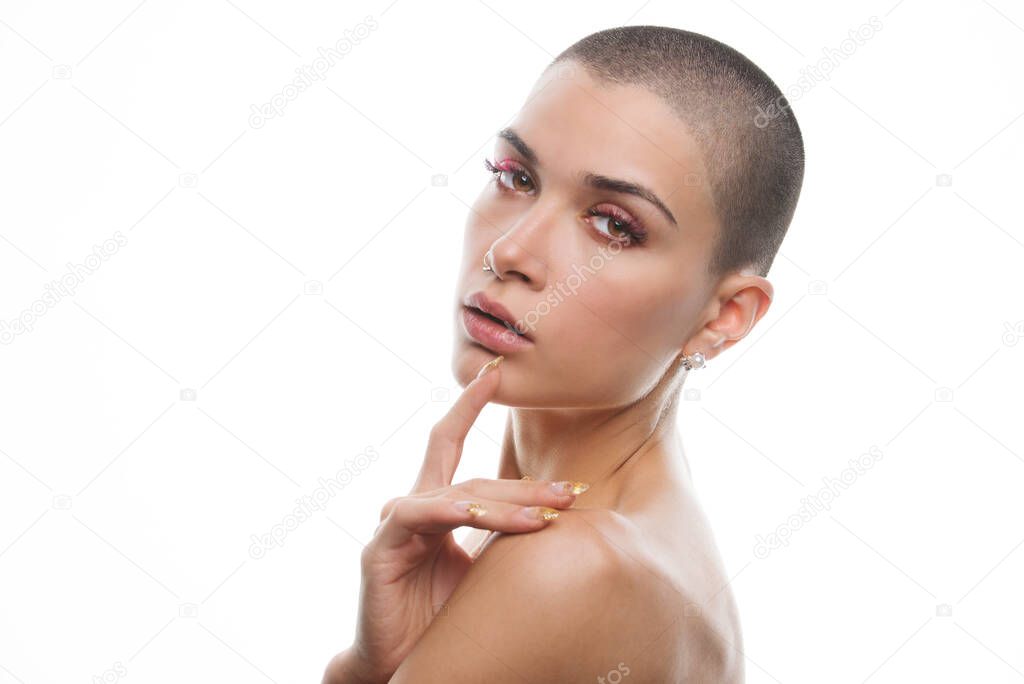 Attractive young woman with short hair posing in studio - Beauty shot of pretty caucasian girl