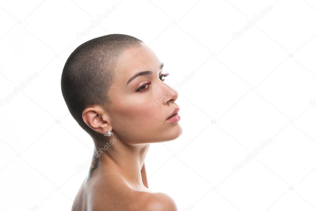 Attractive young woman with short hair posing in studio - Beauty shot of pretty caucasian girl