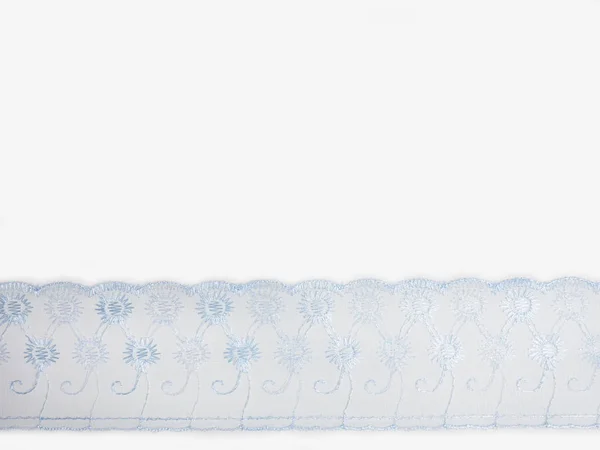 Blue lace on a white background — Stock Photo, Image