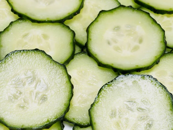 Snijd komkommers door. Macro foto — Stockfoto