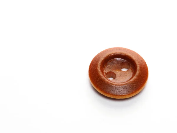 Brown wooden button on white background — Stock Photo, Image