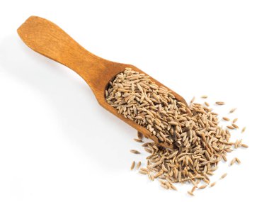 Kimyon tohumları (Cuminum), Jeera beyaz bir sırt deliğinde ahşap bir kepçe içinde