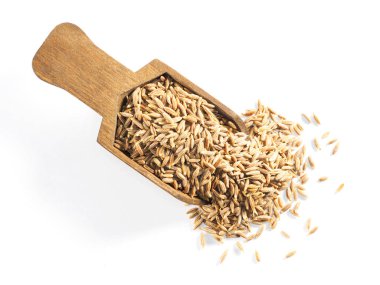 Kimyon tohumları (Cuminum), Jeera (ahşap kepçe içinde) beyaz bir sırt Grou üzerinde