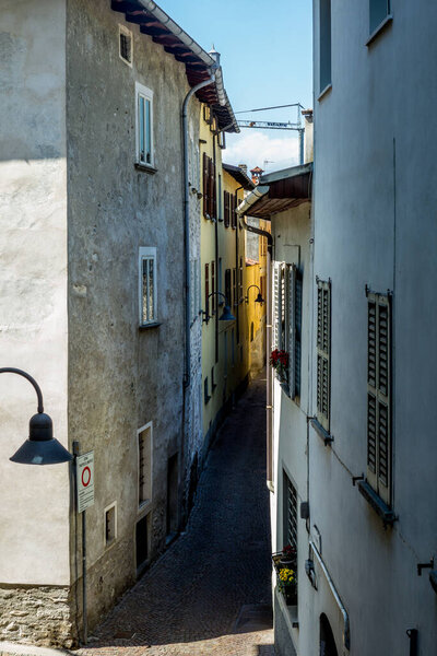 View of the narrow street of Tirano in Italian Valtellina
