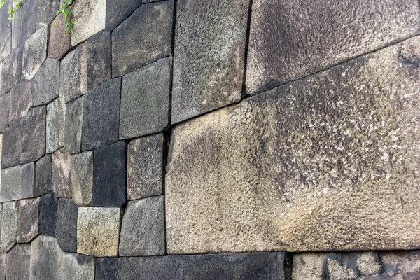 The massive walls of the Imperial Palace in Tokyo