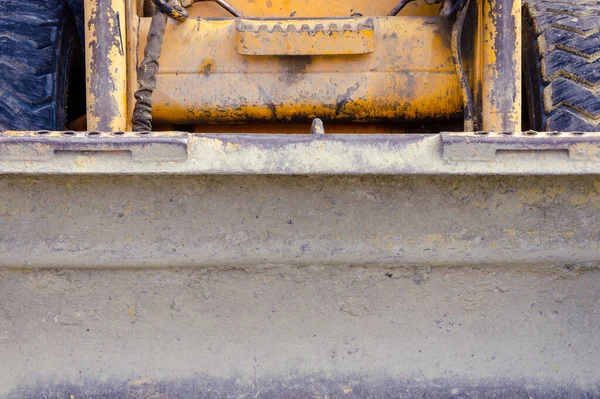 small scratched bulldozer. construction equipment. fruitful work concept