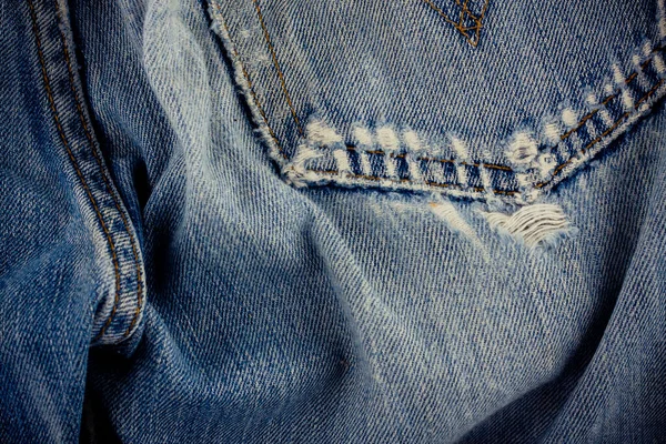 ヴィンテージのファッションデザインのデニムのテクスチャの縫い目とジーンズ不良品の背景デニム — ストック写真