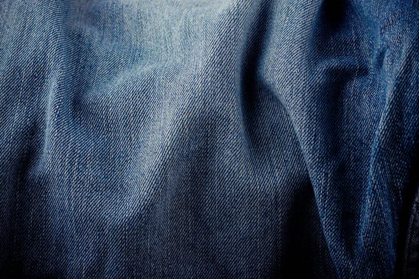 デニムジーンズのテクスチャのためのデザインキャンバスデニムテクスチャ古い青のデニムの背景 — ストック写真