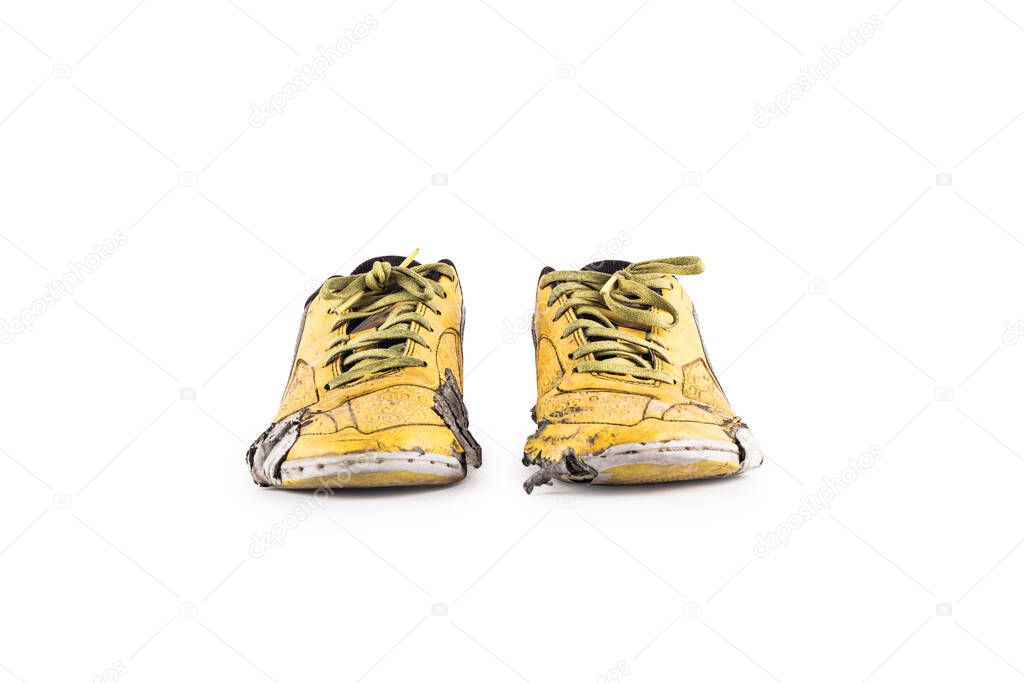 Old damaged synthetic futsal shoes on white background indoor soccer  object isolated