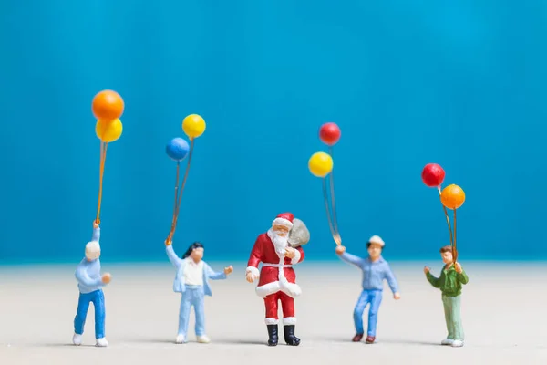 Miniature People Santa Claus Children Holding Balloon Merry Christmas Happy — Stock Photo, Image