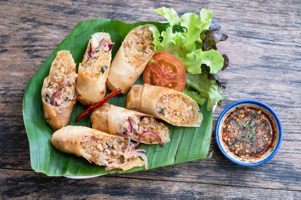 Fried spring rolls on wooden background. — Stock Photo, Image