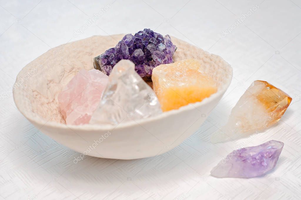 Healing crystals or gemstones: Amethyst Point and cluster, clear quartz, Citrine, calcite and rose quartz are used to bring positive energy and also inner peace