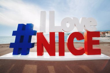  hashtag I Love Nice sign with the view of English Promenade, mo clipart