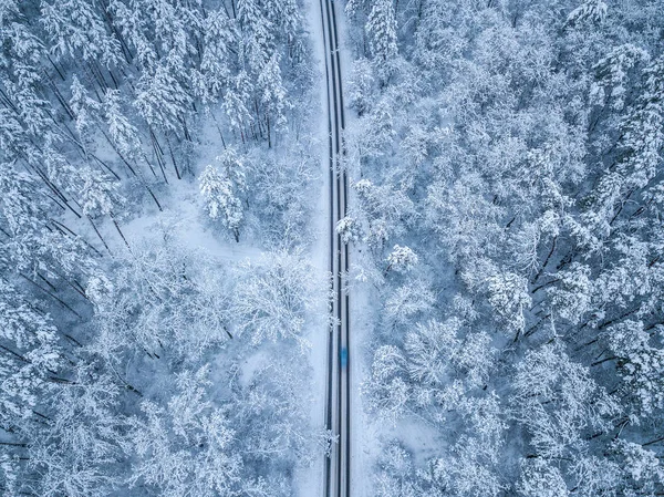 Aerial view of winter road and cars passing by  forest in mounta — Stock Photo, Image