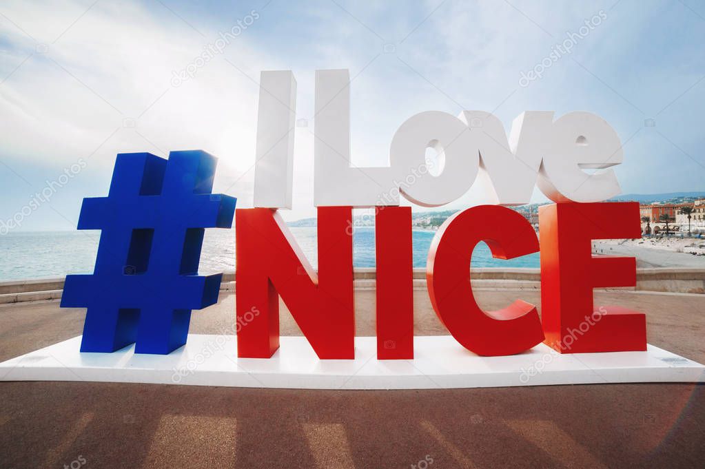  hashtag I Love Nice sign with the view of English Promenade, mo