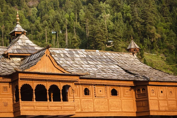 The ornate details in the wooden balconies, windows and the slanted roofs of the ancient Bhimakali temple in the Himalayan village of Sarahan.