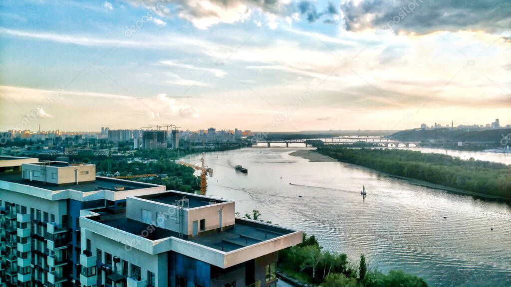 Landscape. Kiev, Ukraine, Ptroutenny cranes on the background of the Dnieper river.