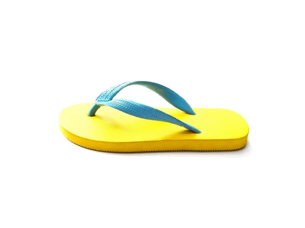 Geel en blauw rubber flip flop schoenen — Stockfoto