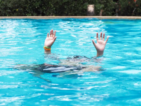 Active Boy diving and raising hands in the air at outdoor swimmi — Stock Photo, Image