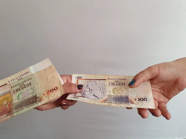 Women Hands Paying Receiving Uruguayan Money — Stock Photo, Image