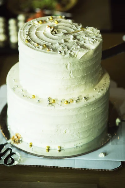 large multi-tiered white cake