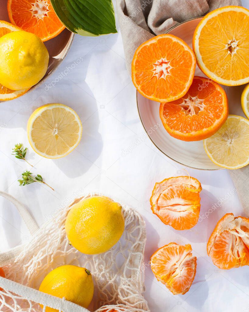 Citrus fruits such as lemon, orange, tangerine. Vitamins, seasonal fruits, food to strengthen the immune system. Copy space. High quality photo