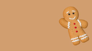 Kahverengi arka planda Noel kurabiyesi adam. Yeni yıl afişi. Mutlu bir yeni yıl kavramı, Noel. Boşluğu kopyala