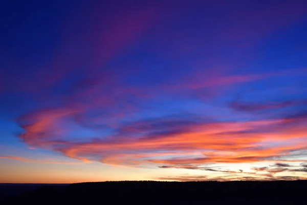 Colorful sunset with red clouds